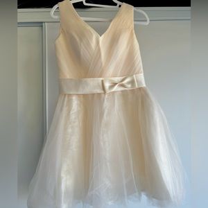 Beautiful dress with bow in cream